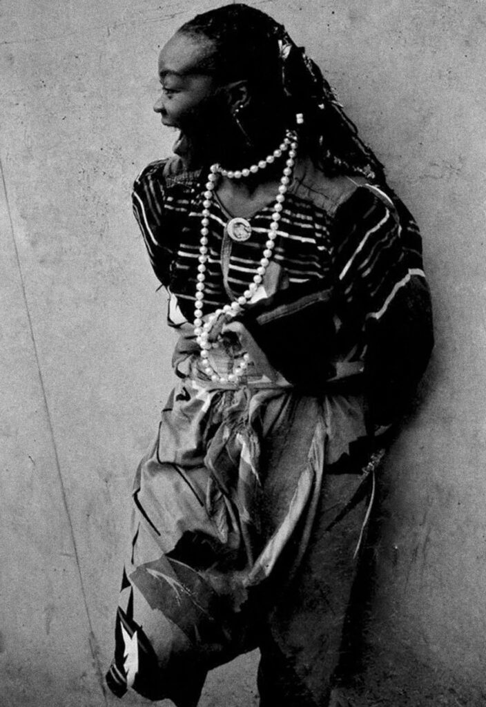 <p>Brenda Fassie takes time out from performing at Ellis Park, April 1984. <em>© Alf Kumalo Estate</em></p>

